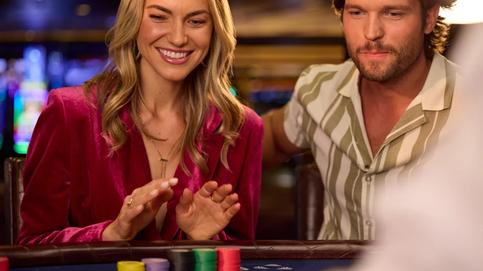 Hollywood Casino at Kansas Speedway Kansas City 3 A couple at a blackjack table in Hollywood Casino at Kansas Speedway’s official casino photography.