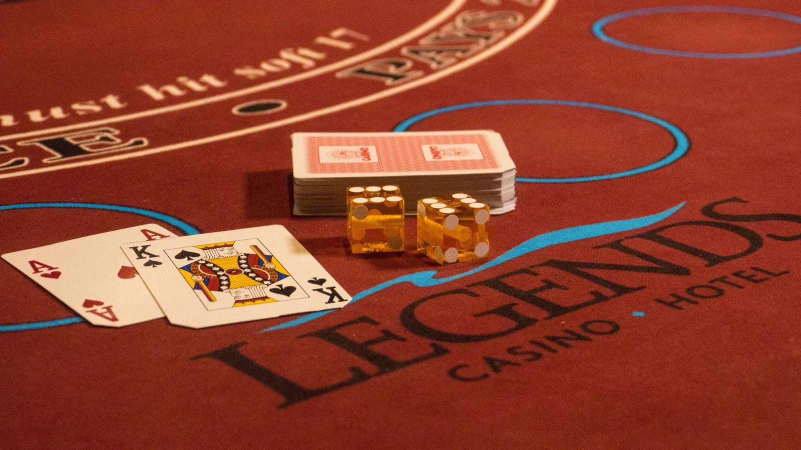 Legends Casino Hotel Toppenish: Games, Hotel, and Dining 2 An ace, a king, and dice on a Legends-branded gaming table.