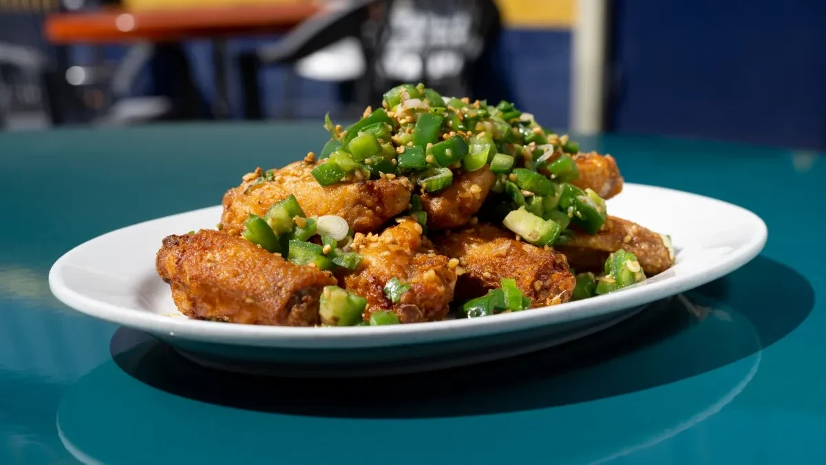 Salt-and-pepper chicken wings at Roxy’s Casino in Seattle.