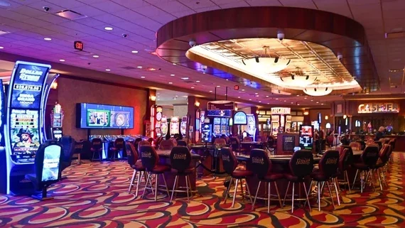 Gaming tables and electronic gaming terminals on the casino floor.